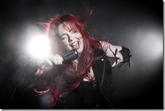 WICKED%20PLAN%20promo%20-%2001a%20Natali%20vocals%20with%20microphone%20(Y62A8316)